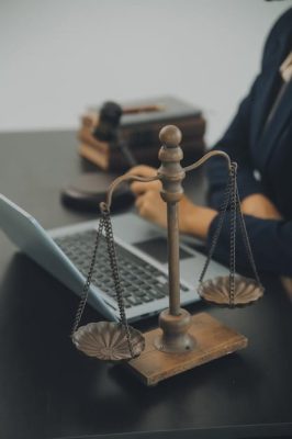 Wire fraud scam recovery lawyer reviewing bank transfer and financial fraud evidence