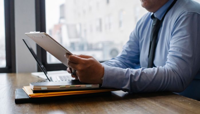 Consumer fraud lawyers in Australia reviewing financial evidence