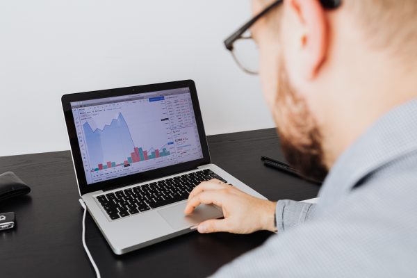 Crypto fraud attorney reviewing digital evidence and financial transaction records