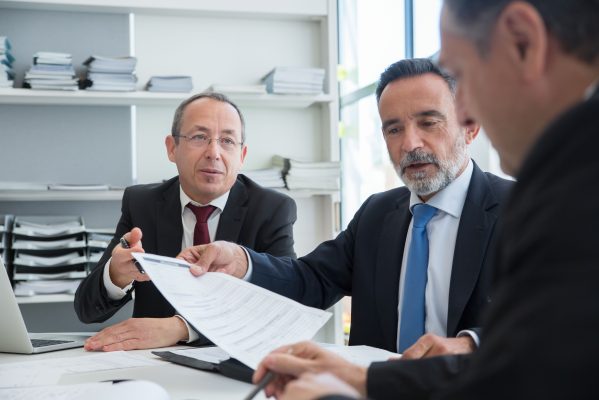 International wire fraud recovery lawyer reviewing cross-border financial transactions