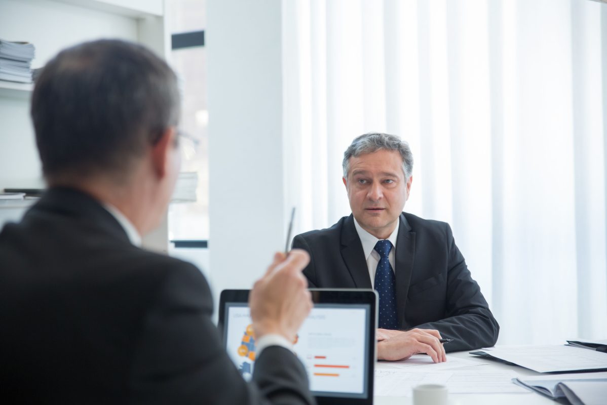 International wire fraud recovery lawyer reviewing cross-border financial transactions