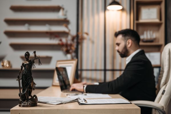 Bank transfer fraud lawyer reviewing wire transfer and cryptocurrency transaction evidence