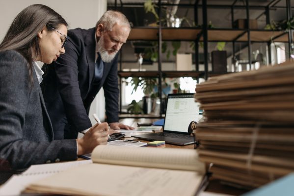 Crypto lawyer reviewing blockchain transaction evidence for a pig butchering scam